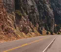 Empty Highway with Rock Wall